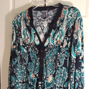 Long sleeve blue, peach and black blouse.